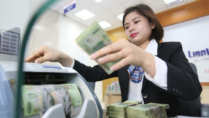 Hỗ trợ cho kế hoạch chào sàn, các ngân hàng nói chung đang khởi đầu 2018 với tăng trưởng lợi nhuận tốt hơn nhiều năm qua - Ảnh: Quang Phúc.