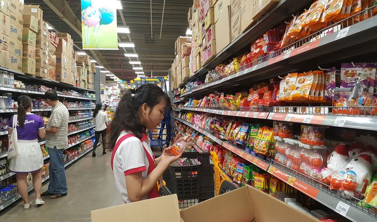 Những quy định mới của Luật Cạnh tranh sẽ khuyến khích, hỗ trợ doanh nghiệp Việt Nam thực hiện các hoạt động mua bán, sáp nhập. Ảnh: Bùi Đức Thâu