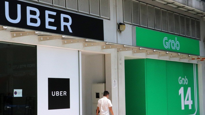 Hồi tháng 3, Uber bán lại hoạt động tại thị trường Đông Nam Á cho đối thủ Grab - Ảnh: Nikkei.