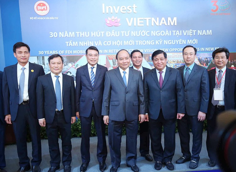 Thủ tướng Nguyễn Xuân Phúc và Bộ trưởng Bộ KH&ĐT Nguyễn Chí Dũng cùng các đại biểu tại hội nghị. Ảnh: Khôi Lâm