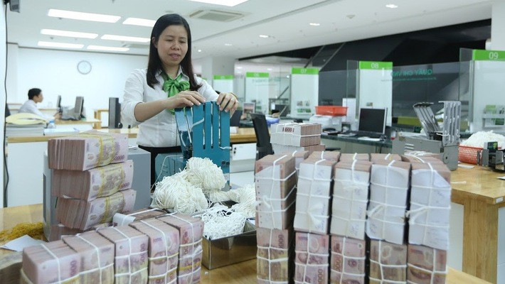Ngân hàng Nhà nước đã bơm ròng 46.414 tỷ đồng ra thị trường qua nghiệp vụ thị trường mở trong tuần qua - Ảnh: Quang Phúc.