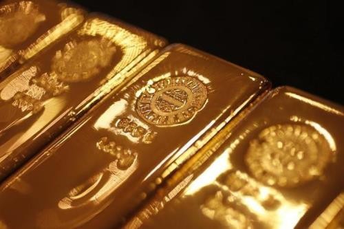 Giá vàng châu Á giảm nhẹ do đồng USD mạnh lên. Ảnh: reuters