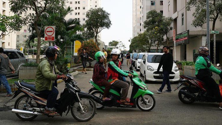 Grab cung cấp dịch vụ gọi ôtô và xe máy tại các thành phố khắp Đông Nam Á - Ảnh: Getty Images.