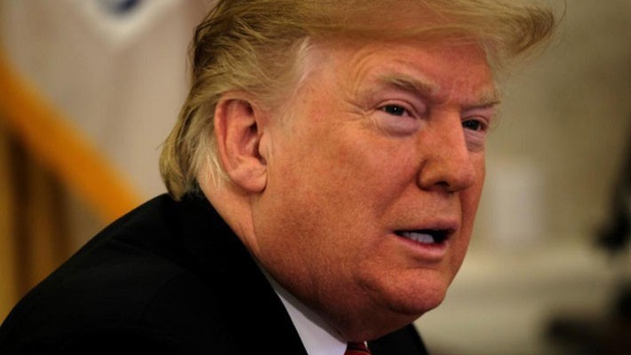 Tổng thống Mỹ Donald Trump phát biểu trước báo giới tại Nhà Trắng ngày 25/12 - Ảnh: Reuters.