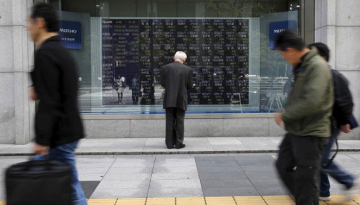 Giới đầu tư chứng khoán tại khu vực châu Á lạc quan hơn trong phiên giao dịch ngày 7/1 - Ảnh: Reuters.