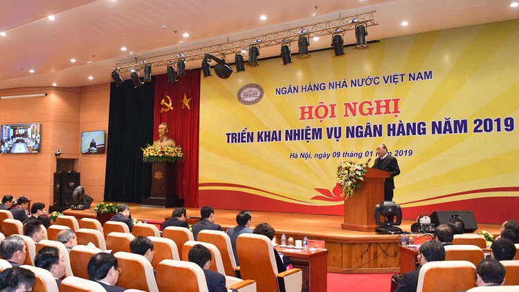 Thủ tướng Chính phủ Nguyễn Xuân Phúc phát biểu tại Hội nghị triển khai nhiệm vụ ngân hàng năm 2019. Ảnh: Hiếu Nguyễn