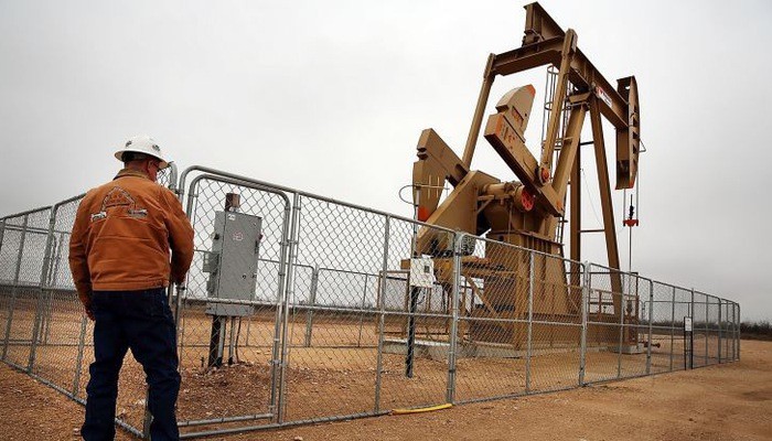 Một giếng dầu ở vùng Permian Basin thuộc bang Texas của Mỹ hồi năm 2015 - Ảnh: Reuters/CNBC.