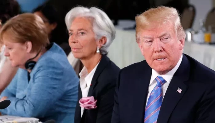 Từ phải qua: Tổng thống Mỹ Donald Trump, Tổng giám đốc Quỹ Tiền tệ Quốc tế (IMF) Christine Lagarde, và Thủ tướng Đức Angela Markel tại thượng đỉnh khối G7 ở Quebec, Canada, tháng 6/2018 - Ảnh: Reuters.