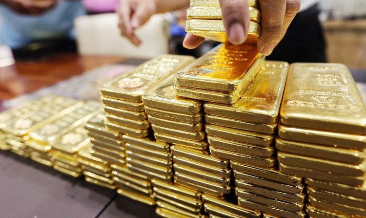 Giá vàng thế giới có thể tiếp tục tăng giảm xung quanh ngưỡng 1.400 USD/oz. Ảnh: Minh Ngọc