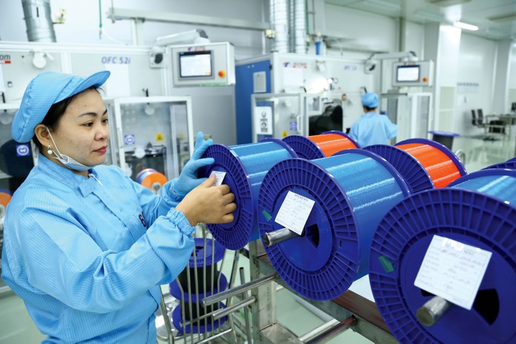 Doanh nghiệp Việt phải nâng cao năng suất lao động dựa trên nền tảng đổi mới sáng tạo, khoa học công nghệ để không ngừng lớn mạnh. Ảnh: Lê Tiên