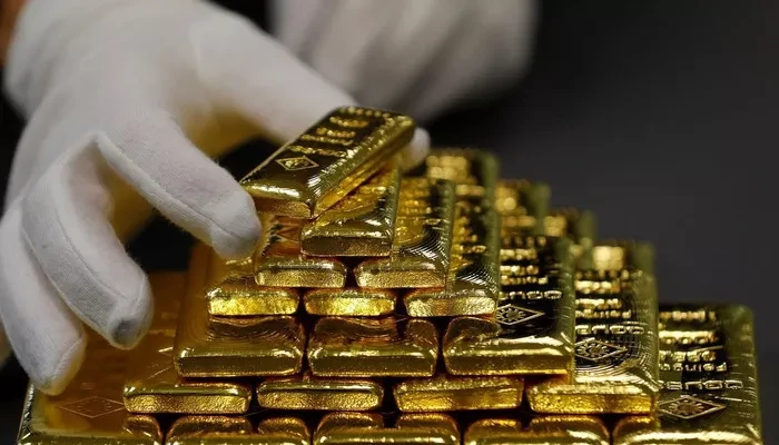 Giá vàng thế giới đã tăng 18% trong năm nay - Ảnh: Reuters.