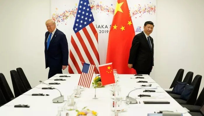 Tổng thống Mỹ Donald Trump (trái) và Chủ tịch Trung Quốc Tập Cận Bình trong cuộc gặp tại thượng đỉnh G20 ở Osaka tháng 6/2019 - Ảnh: Reuters/CNBC.