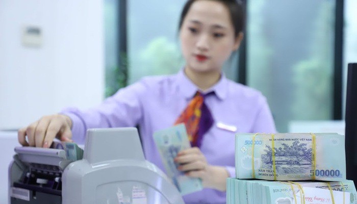 Ngân hàng Nhà nước tiếp tục trả lại thị trường 3.000 tỷ đồng thông qua thị trường mở - Ảnh: Quang Phúc.
