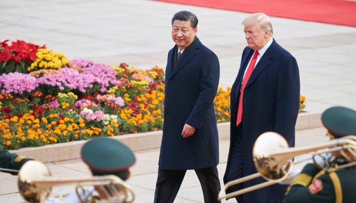 Chủ tịch Trung Quốc Tập Cận Bình (trái) và Tổng thống Mỹ Donald Trump trong chuyến thăm Bắc Kinh của ông Trump hồi tháng 11/2017 - Ảnh: Tass/Getty/CNBC.