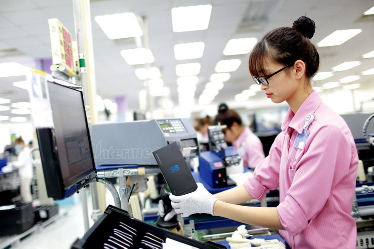 Nhờ tham gia vào chuỗi giá trị toàn cầu, cơ cấu xuất khẩu của Việt Nam đã thay đổi đáng kể cả về công nghệ và sản phẩm xuất khẩu. Ảnh: Việt Hưng