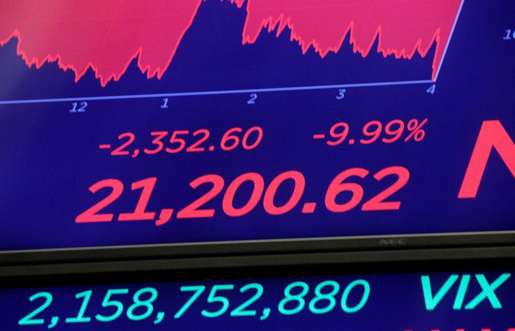 Màn hìnhtrênSàn giao dịch chứng khoán New York (NYSE) sau khi kết thúc phiên giao dịch 12/3 tại New York, Mỹ.Ảnh: Reuters.