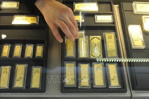 Vàng châu Á vững giá trên mức 1.700 USD/ounce. Ảnh: TTXVN