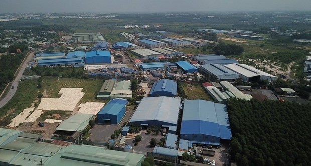 Hàng chục doanh nghiệp xây dựng nhà xưởng trong khu đất quy
hoạch cụm công nghiệp Phước Tân chưa được cấp phép. Ảnh: TTXVN