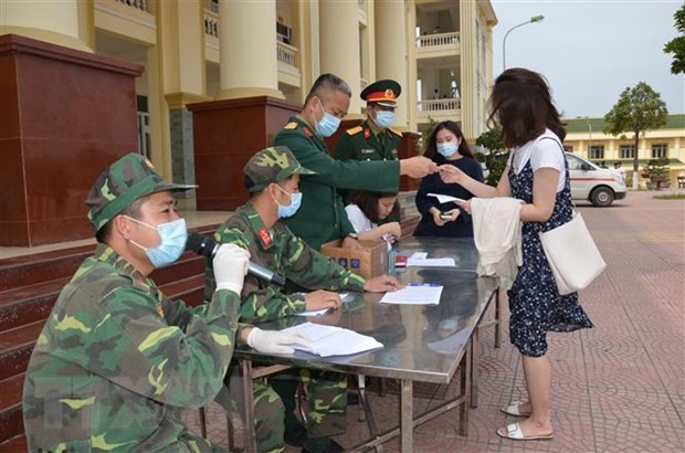 Các công dân thực hiện cách ly tại Trường Quân sự Bộ Tư lệnh
Thủ đô Hà Nội. Ảnh: TTXVN phát
