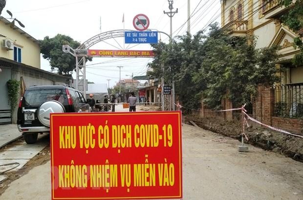 Chốt kiểm soát dịch tại xã Bình Dương, thị xã Đông Triều, tỉnh Quảng Ninh. (Ảnh: TTXVN phát)