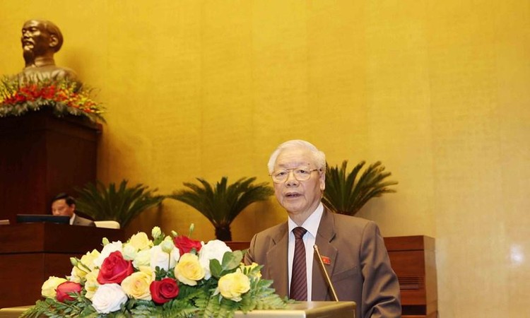 Chủ tịch nước Nguyễn Phú Trọng trình Quốc hội miễn nhiệm chức vụ Thủ tướng Chính phủ đối với ông Nguyễn Xuân Phúc. Ảnh: TTXVN