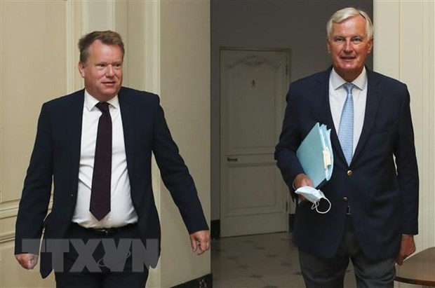 Trưởng đoàn đàm phán thương mại hậu Brexit của Anh David Frost (trái) và người đồng cấp EU Michel Barnier (phải) tại vòng đàm phán thứ 7 ở Brussels, Bỉ ngày 21/8/2020. (Nguồn: AFP/TTXVN)