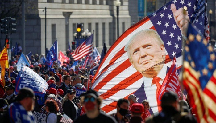 Người ủng hộ Tổng thống Mỹ Donald Trump xuống đường ở Washington ngày 14/11 - Ảnh: Reuters. 